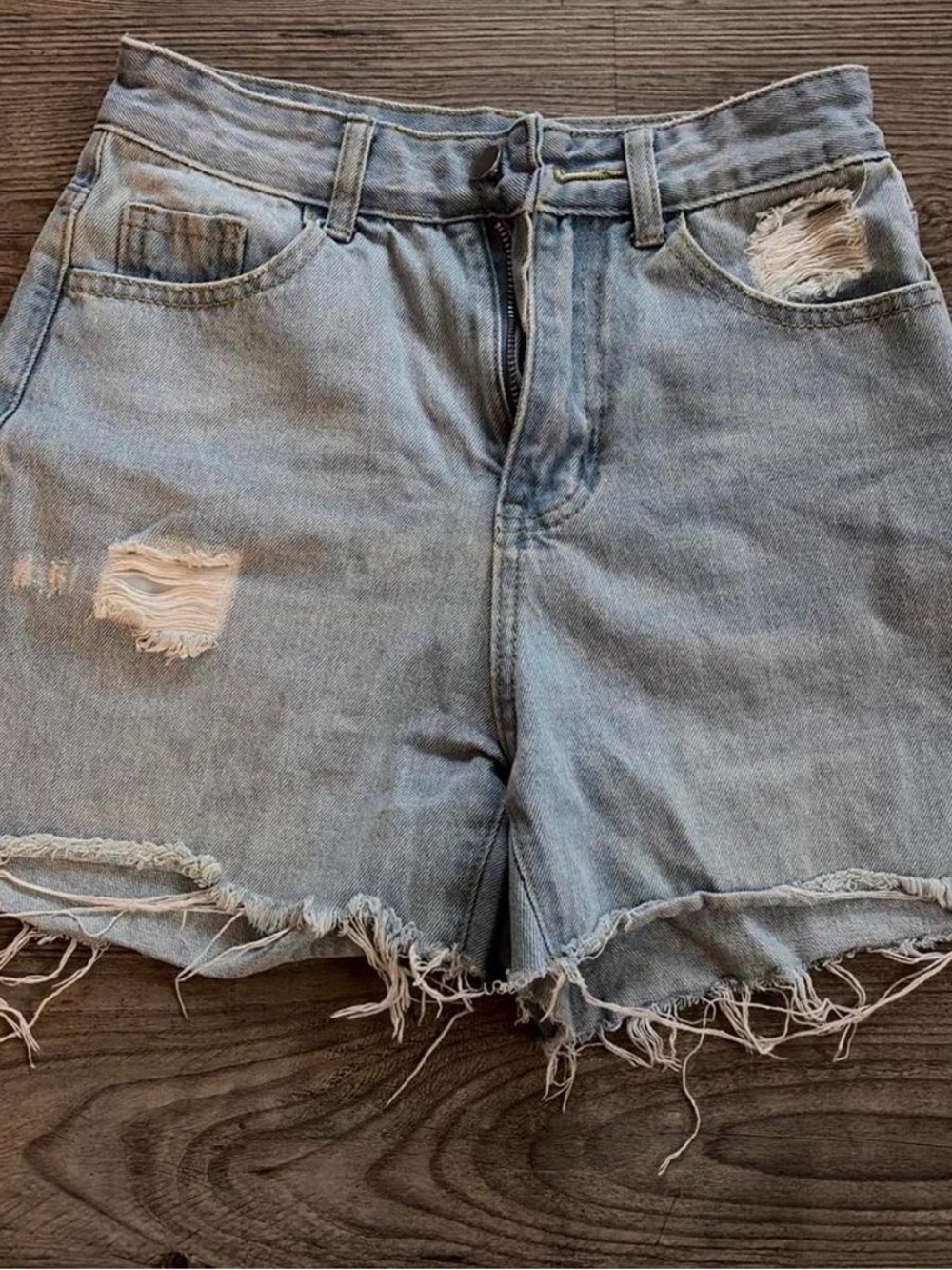 Women’s Distressed Light Blue Denim Shorts